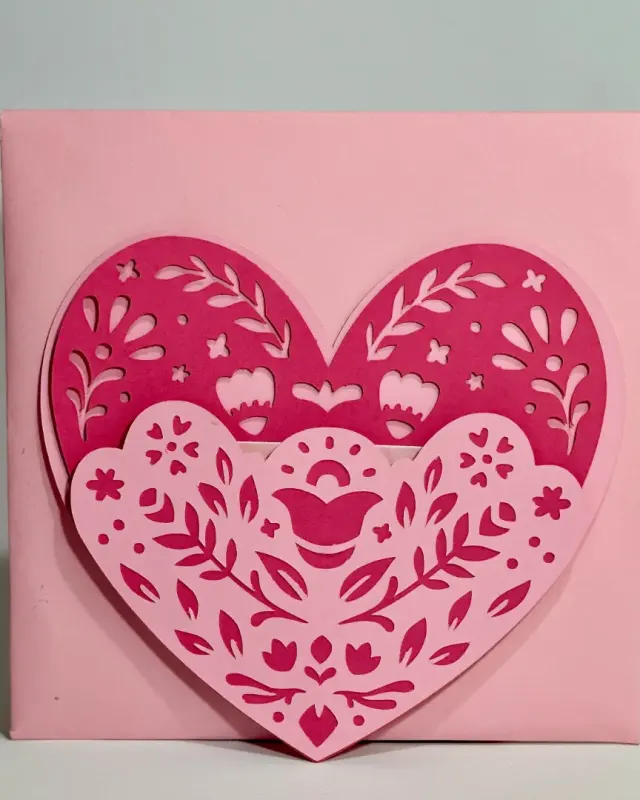 hand made intricately cut heart shaped valentine card with provision for gift coupon